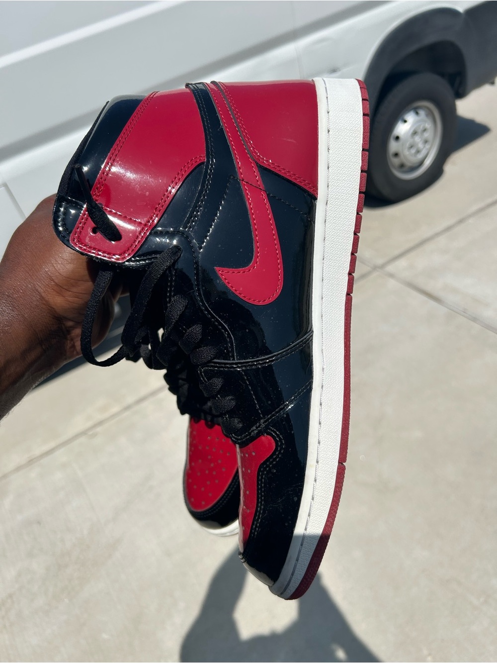 Jordan Men's High-Top Sneaker in Black and Red